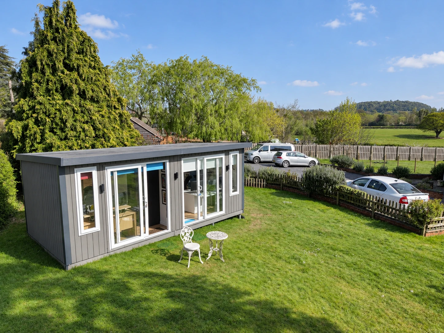 Aerial view of a Noah garden building in a Bromsgrove garden with countryside beyond